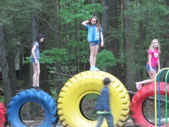 Kids playing on the playground at Rip Van Winkle Campgrounds in the Catskills